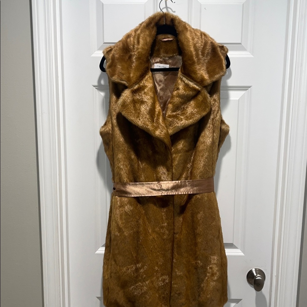 Calvin Klein Honey Gold Faux Fur Vest NWT 
Belt collar longline pockets luxury